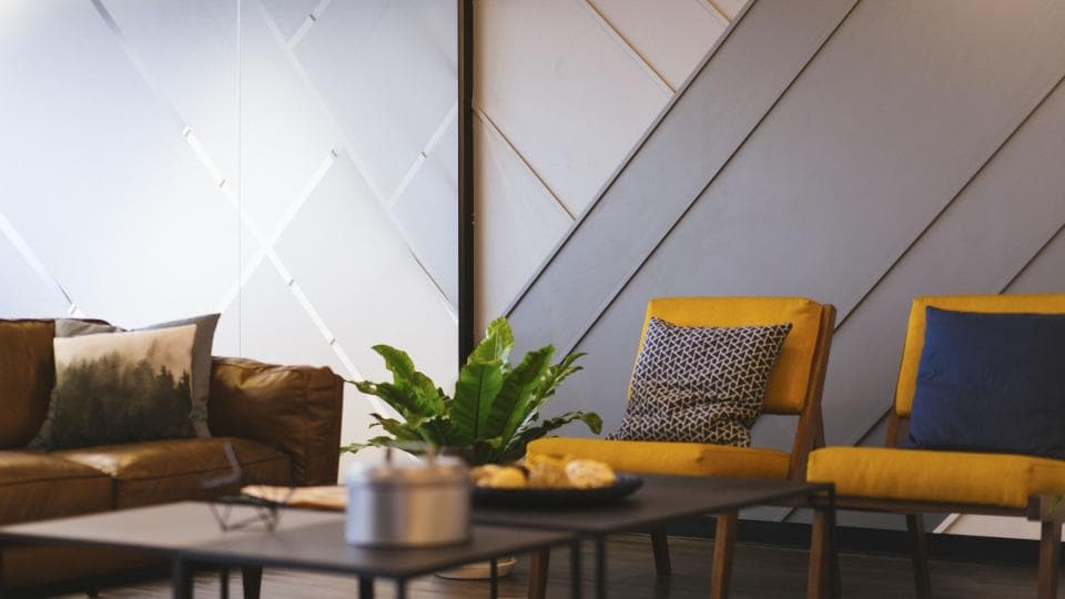Bright living room with a gray sofa and cushions